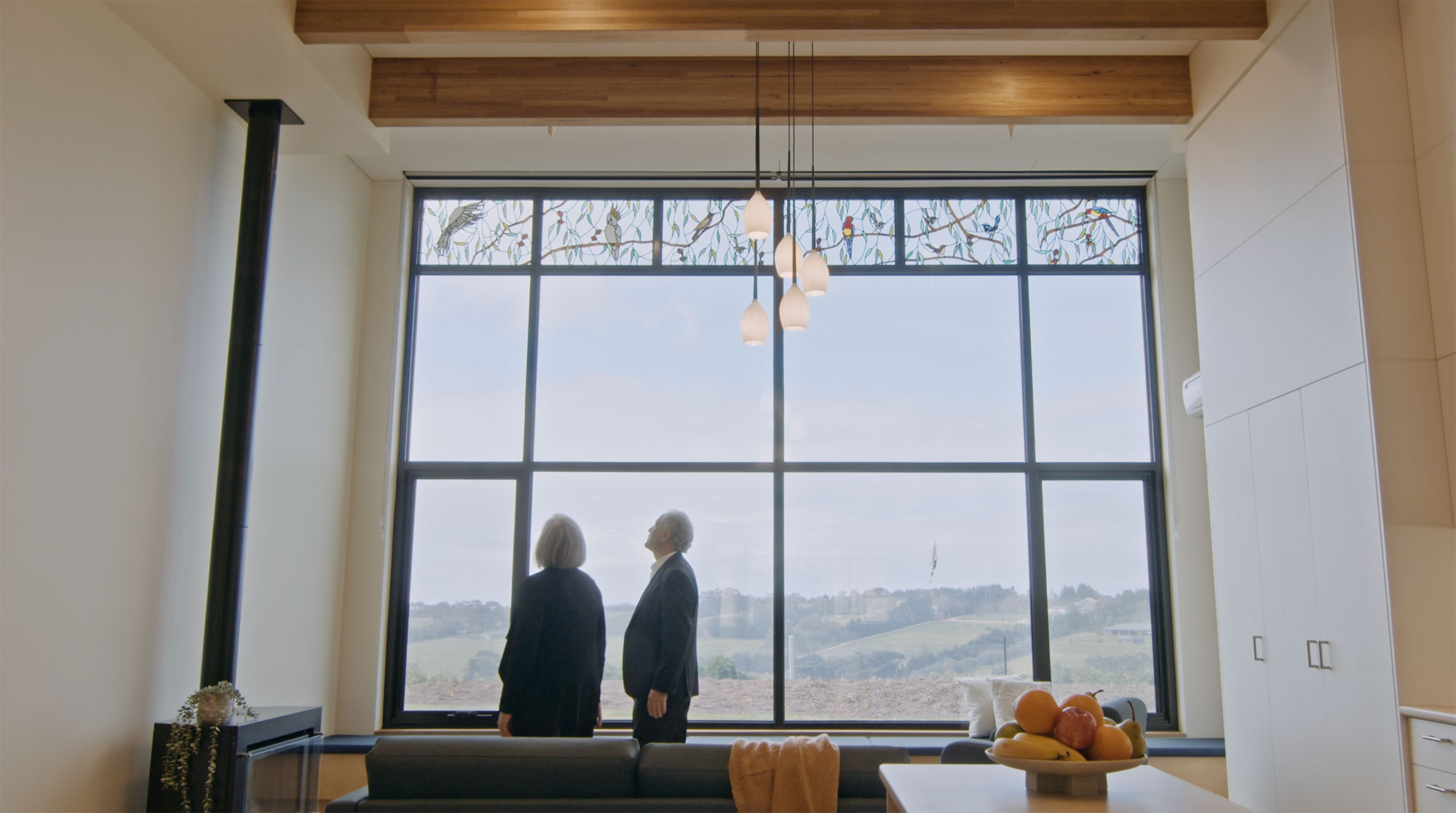 Elizabeth and Sedar at the window in Anam Cara