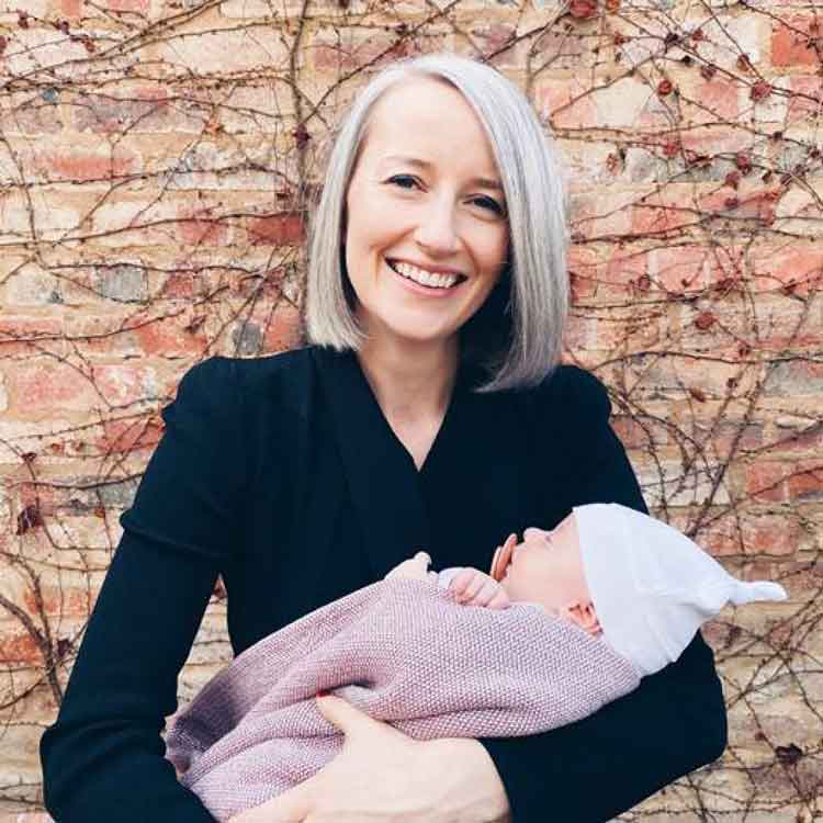 Lady holding baby